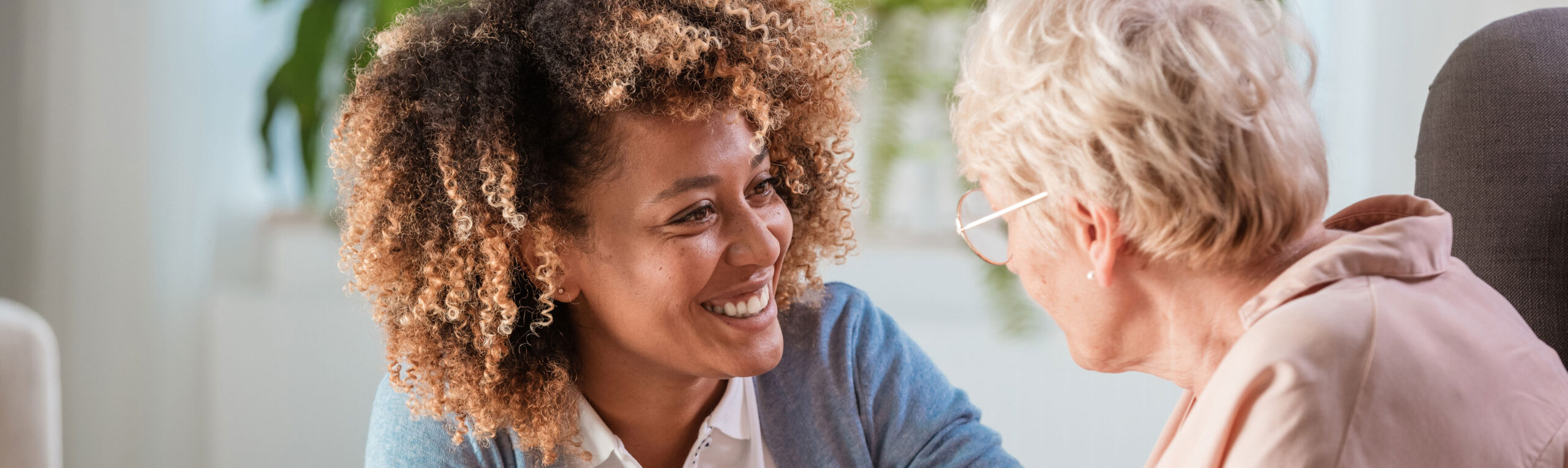 happy social worker with a client